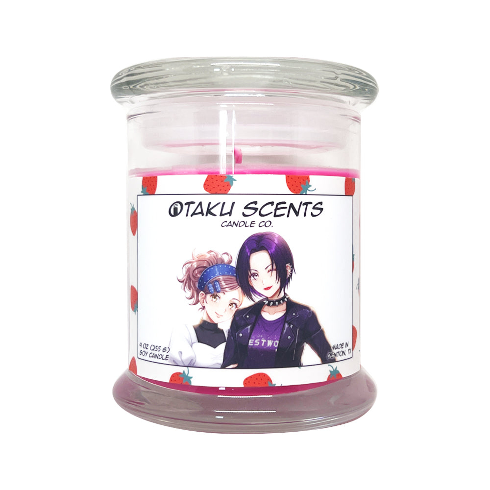 Otaku Scents brand jar candle with lid, with anime characters Nana and Hachi on the label.